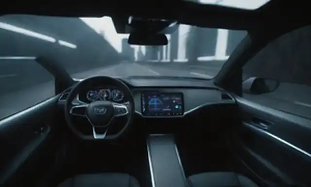 3D rendering of a futuristic car interior, cockpit computer screen displaying IA-driven navigation, sleek dashboard design, gafas de realidad virtual usados por conductor, autónomos indicadores de modo de conducción, y efectos de iluminación sutiles para representar tecnología avanzada