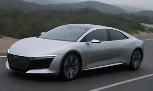 coche elegante, futurista, sedán de lujo, faros LED, conducción autónoma, tecnología avanzada, tecnología de estado sólido, panel de alta tecnología, sistema de información avanzado, interior premium, diseño aerodinámico, exterior deportivo, características innovadoras
