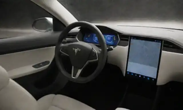 2020 Tesla Modelo 3 interior, volante, panel de mando, asientos, iluminación ambiental, diseño minimalista, coche de lujo compacto, materiales premium, interfaz de usuario moderna, integración de smartphones
